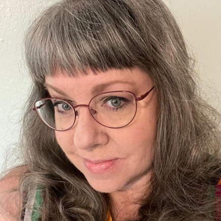 At last! Jacki Smith—a woman who definitely knows her stuff when it comes to candle magic